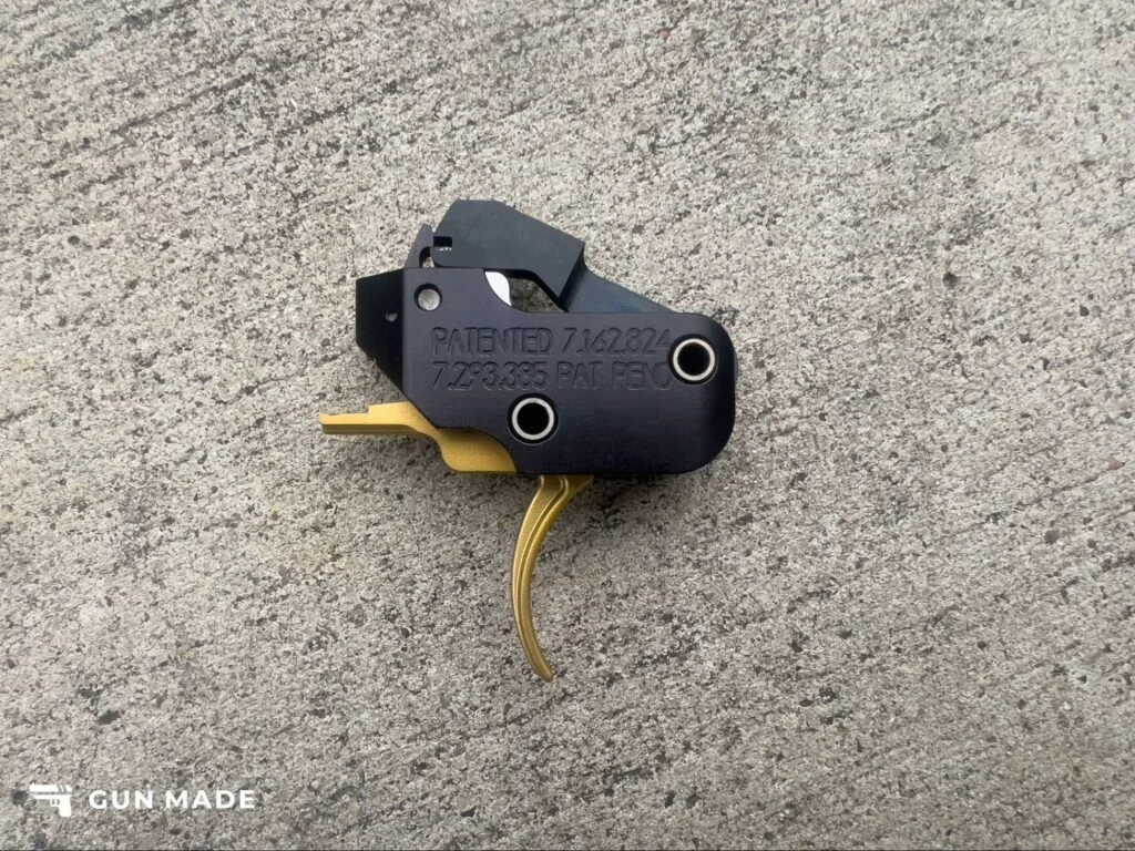 American Trigger Corp AR Gold Adjustable Trigger close up