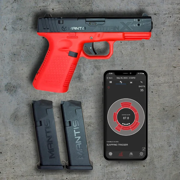 Four Mantis Laser Academy smart targets mounted on a wall for structured, app-based dry-fire drills