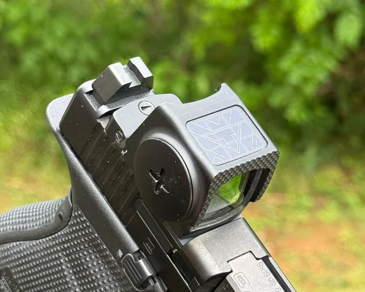 Side profile view showing the integrated top solar panel and front Fast-Rack texturing on the Vortex Defender-ST Enclosed Solar