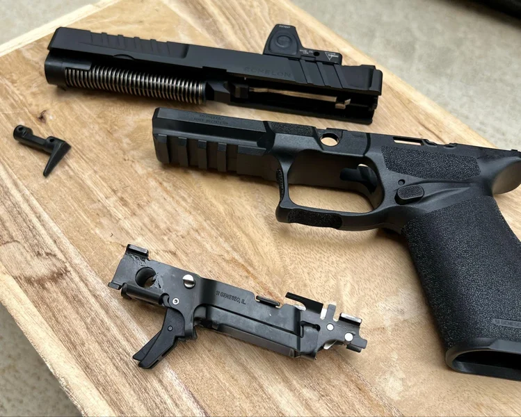 Springfield Armory Echelon's Central Operating Group removed from the grip module, showcasing its tool-free design