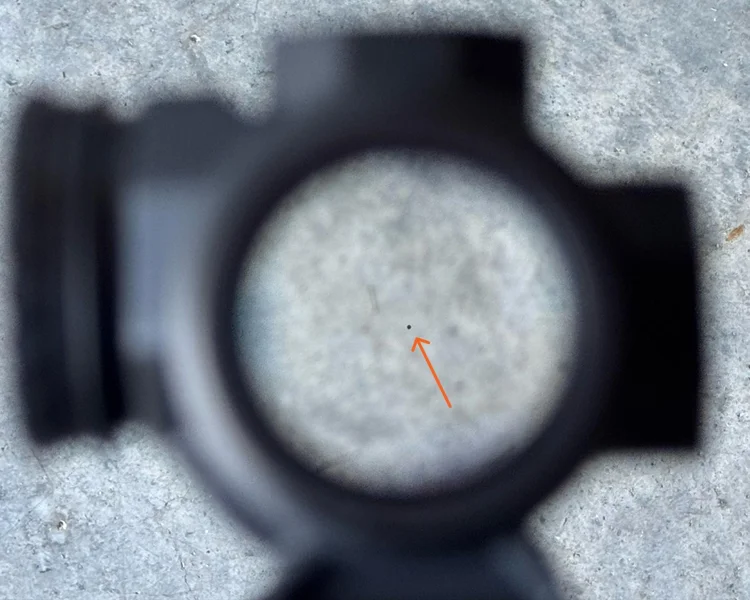 View through the Swampfox Raider's lens, highlighting its etched 6 MOA dot reticle