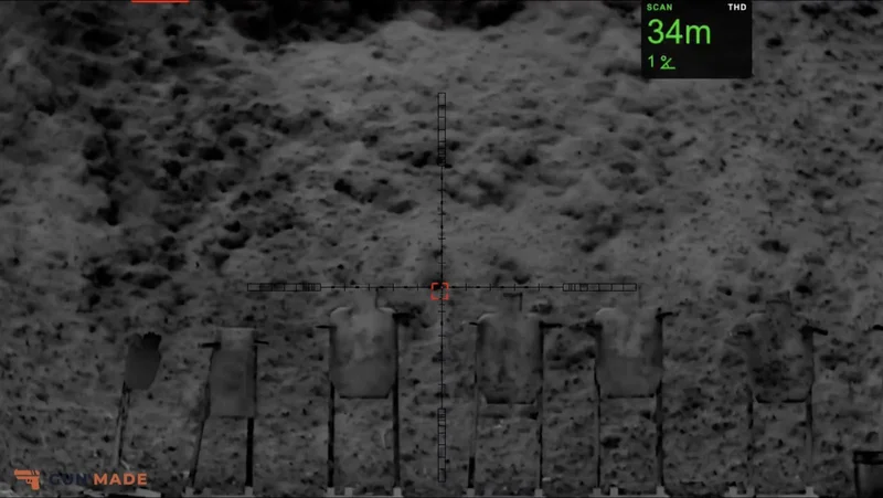 XL60 white-hot view of a steel target line with the rangefinder reading 34 meters