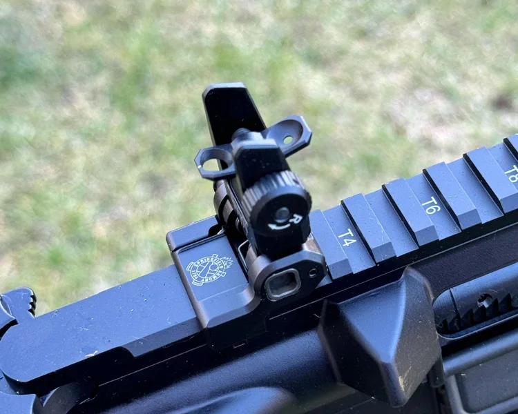 AR-15 front sight requiring a separate adjuster tool, not included