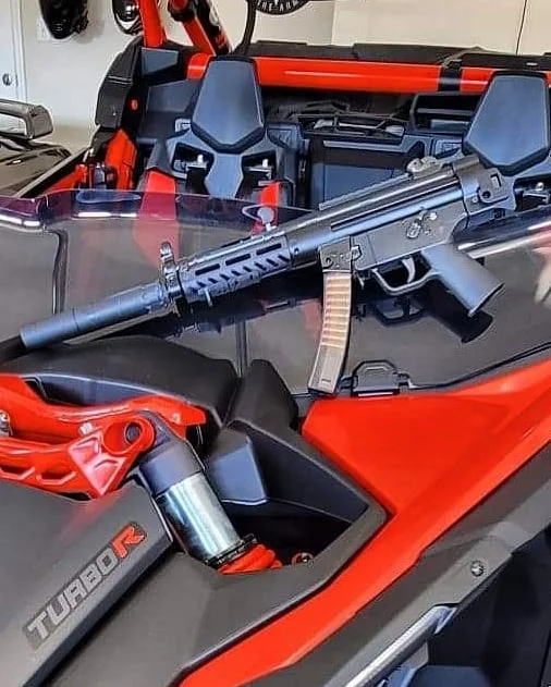 PTR 9c with a folding SBT5KA brace and a 3-lug Rugged Obsidian 9 suppressor