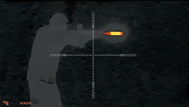 XL60 screen capture of a suppressed shooter firing, red and yellow on the suppressor.